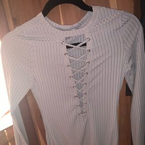 SHEIN Beige bodysuit clips at the bottom sz L